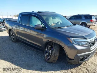 2019 Honda Ridgeline RTL with VIN 5FPYK2F5XKB008596, listed as a IAAI auction lot 41137243 with 121,945 mi miles. Bid and sale history available at carsss.com. Image 1.