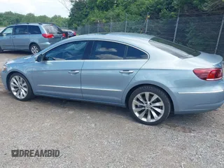 2013 Volkswagen CC Executive z VIN WVWGU7AN3DE524175, wystawiony jako IAAI lot #42401952 z przebiegiem 165 023 mil mil oraz . Historia ofert i sprzedaży dostępna na DreamBid. Obrazek 3.