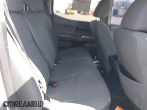 2020 Toyota Tacoma SR5 with VIN 3TMCZ5AN5LM339977, listed as a IAAI auction lot 41886937 with 94,986 mi miles and . Bid and sale history available at DreamBid. Image 8.