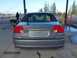 2004 Honda Civic LX with VIN 2HGES165X4H536000, listed as a IAAI auction lot 41950233 with 214,537 mi miles. Bid and sale history available at carsss.com. Image 16.