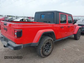 2024 Jeep Gladiator Sport with VIN 1C6HJTAG5RL101616, listed as a IAAI auction lot 42156992 with 31,824 mi miles and . Bid and sale history available at DreamBid. Image 4.
