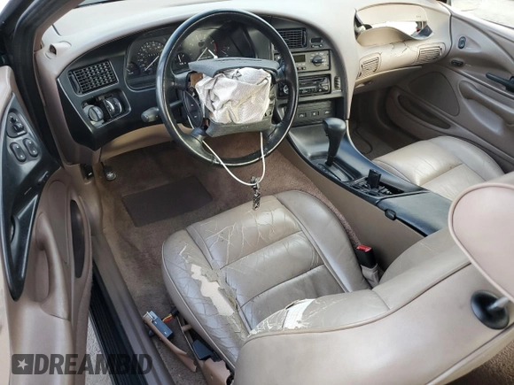1994 Ford Thunderbird LX with VIN 1FALP62W6RH128762, listed as a Copart auction lot 84306604 with 68,314 mi miles and Salvage Title. Bid and sale history available at DreamBid. Image 8.