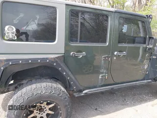 2007 Jeep Wrangler Unlimited X with VIN 1J4GA39147L101084, listed as a IAAI auction lot 41988628 with 194,562 mi miles and . Bid and sale history available at DreamBid. Image 13.