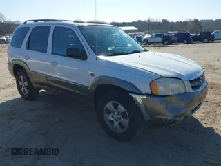 2003 Mazda Tribute ES with VIN 4F2CZ96113KM54743, listed as a IAAI auction lot 41640604 with 171,648 mi miles. Bid and sale history available at carsss.com. Image 1.