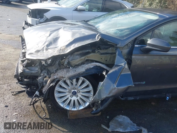 2015 Ford Fusion S Hybrid with VIN 3FA6P0UU9FR283189, listed as a IAAI auction lot 41632307 with 152,653 mi miles. Bid and sale history available at carsss.com. Image 20.
