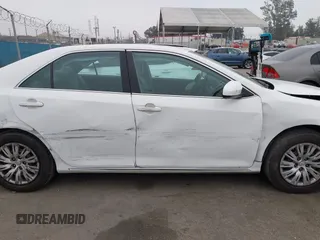 2014 Toyota Camry L with VIN 4T4BF1FK1ER416128, listed as a IAAI auction lot 42030370 with 79,475 mi miles and . Bid and sale history available at DreamBid. Image 13.