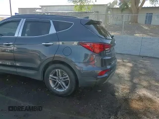 2018 Hyundai Santa Fe 2.4L с VIN 5NMZUDLB6JH097285, выставлен на аукционе Copart как лот 62333795 с пробегом 90 476 миль миль и Списание • Salvage title. История ставок и продаж доступна на DreamBid. Изображение 14.