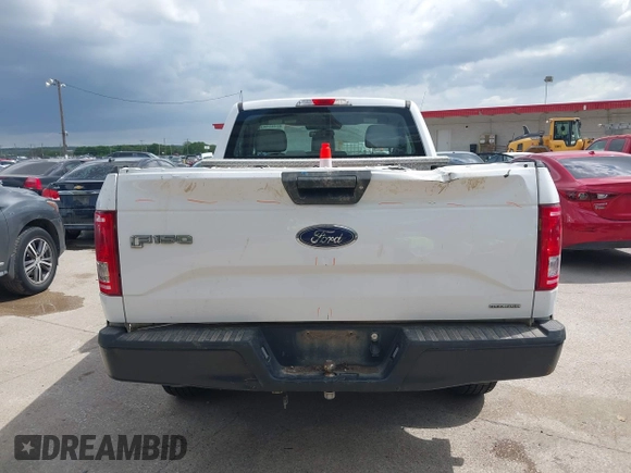 2015 Ford F-150 XL with VIN 1FTMF1E84FKD12758, listed as a IAAI auction lot 41841584 with 59,950 mi miles and . Bid and sale history available at DreamBid. Image 8.
