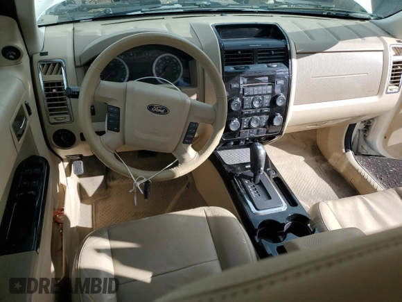 2010 Ford Escape Limited z VIN 1FMCU0EG8AKB93264, wystawiony jako Copart lot #48755805 z przebiegiem 69 141 mil mil oraz Szkoda całkowita • Salvage title. Historia ofert i sprzedaży dostępna na DreamBid. Obrazek 8.