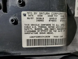 1997 Saturn SL with VIN 1G8ZF5285VZ412630, listed as a Copart auction lot 74937694 with 165,371 mi miles and Salvage Title. Bid and sale history available at carsss.com. Image 14.