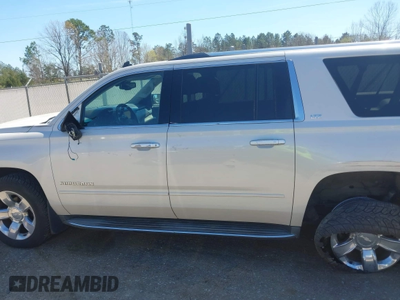 2015 Chevrolet Suburban LTZ with VIN 1GNSCKKC3FR113388, listed as a IAAI auction lot 41867964 with 238,530 mi miles and . Bid and sale history available at DreamBid. Image 15.