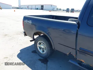 2000 Ford F-150 XL with VIN 1FTRX18LXYNB41132, listed as a IAAI auction lot 42173717 with Not provided miles and . Bid and sale history available at DreamBid. Image 12.