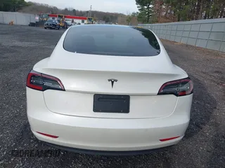 2021 Tesla Model 3 Long Range with VIN 5YJ3E1EB8MF974007, listed as a IAAI auction lot 41915513 with 107,354 mi miles and . Bid and sale history available at carsss.com. Image 16.
