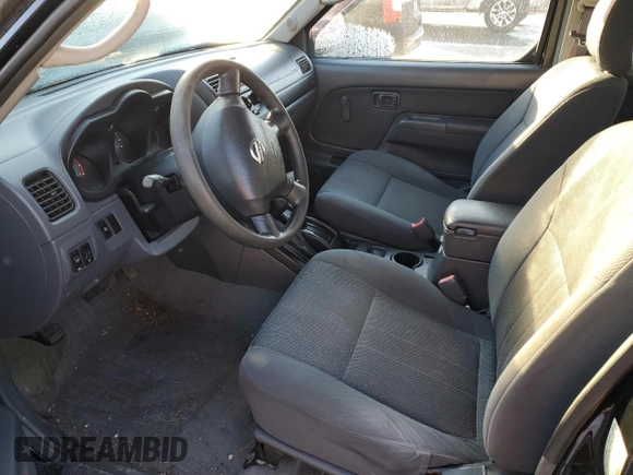 2003 Nissan Frontier XE z VIN 1N6ED26Y53C465862, wystawiony jako Copart lot #41848565 z przebiegiem Nie podano mil oraz Szkoda całkowita • Salvage title. Historia ofert i sprzedaży dostępna na DreamBid. Obrazek 7.