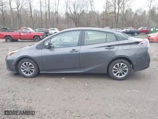 2019 Toyota Prius L Eco with VIN JTDKARFU7K3077941, listed as a IAAI auction lot 41865759 with 254,612 mi miles. Bid and sale history available at carsss.com. Image 14.