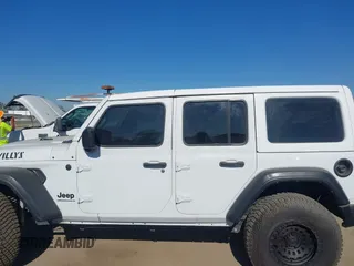 2023 Jeep Wrangler Willys with VIN 1C4HJXDG0PW638871, listed as a IAAI auction lot 42700599 with 16,171 mi miles and . Bid and sale history available at DreamBid. Image 14.