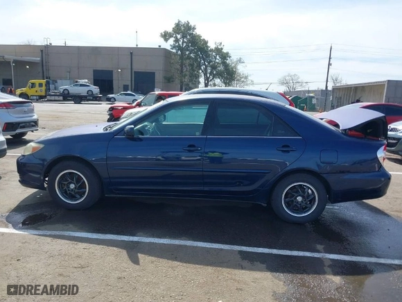 2004 Toyota Camry LE with VIN 4T1BE32K84U381293, listed as a IAAI auction lot 41765044 with 228,746 mi miles. Bid and sale history available at carsss.com. Image 14.