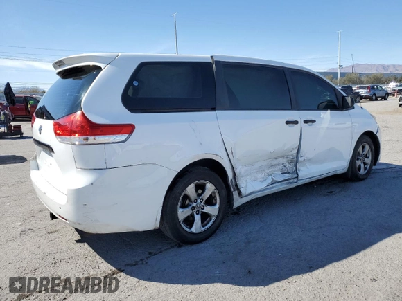 2012 Toyota Sienna with VIN 5TDZK3DC2CS244967, listed as a Copart auction lot 49787795 with 242,667 mi miles and Salvage Title. Bid and sale history available at carsss.com. Image 3.