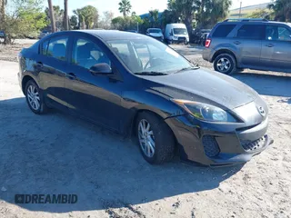 2013 Mazda 3 i Touring z VIN JM1BL1VP8D1809631, wystawiony jako IAAI lot #41707214 z przebiegiem 124 975 mil mil oraz . Historia ofert i sprzedaży dostępna na DreamBid. Obrazek 1.