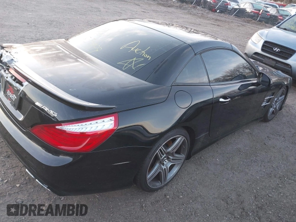 2013 Mercedes-Benz SL 63 AMG with VIN WDDJK7EA8DF004394, listed as a IAAI auction lot 41766515 with Not provided miles and . Bid and sale history available at DreamBid. Image 4.