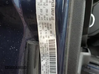 2010 Jeep Commander Sport with VIN 1J4RG4GK5AC119433, listed as a Copart auction lot 87657265 with 212,973 mi miles and Salvage title. Bid and sale history available at DreamBid. Image 13.