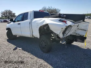 2021 Toyota Tundra SR with VIN 5TFRY5F18MX280888, listed as a Copart auction lot 48554635 with 141,882 mi miles and Non repairable. Bid and sale history available at DreamBid. Image 2.