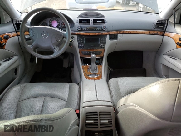 2003 Mercedes-Benz E-Class 5.0L with VIN WDBUF70J83A205550, listed as a Copart auction lot 76399474 with 118,646 mi miles and Salvage Title. Bid and sale history available at carsss.com. Image 8.