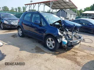 2011 Suzuki SX4 Crossover with VIN JS2YB5A38B6301589, listed as a IAAI auction lot 40112766 with 128,323 mi miles. Bid and sale history available at carsss.com. Image 1.