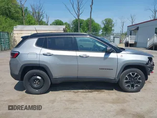 2021 Jeep Compass Trailhawk z VIN 3C4NJDDB7MT590390, wystawiony jako IAAI lot #42163205 z przebiegiem 70 551 mil mil oraz . Historia ofert i sprzedaży dostępna na DreamBid. Obrazek 14.