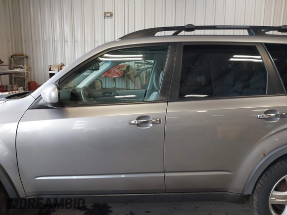 2009 Subaru Forester X with VIN JF2SH63619H731296, listed as a IAAI auction lot 42294036 with 184,739 mi miles and . Bid and sale history available at DreamBid. Image 14.