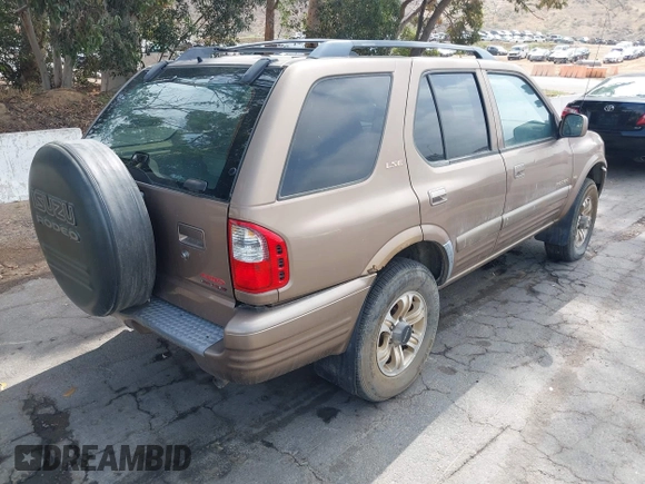 2000 Isuzu Rodeo with VIN 4S2DM58W3Y4328503, listed as a IAAI auction lot 42405198 with 190,328 mi miles and . Bid and sale history available at DreamBid. Image 4.