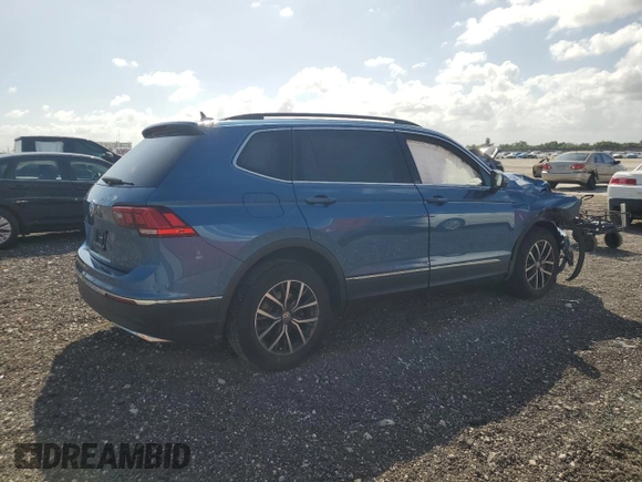2020 Volkswagen Tiguan SE z VIN 3VV3B7AX2LM035055, wystawiony jako Copart lot #82392284 z przebiegiem 43 302 mil mil oraz Nie do naprawy • Non repairable. Historia ofert i sprzedaży dostępna na DreamBid. Obrazek 3.