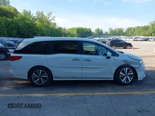 2022 Honda Odyssey Touring with VIN 5FNRL6H88NB026592, listed as a IAAI auction lot 42367048 with 57,066 mi miles and . Bid and sale history available at DreamBid. Image 13.
