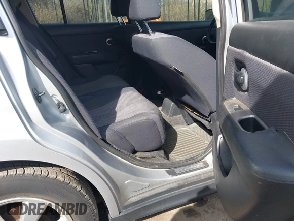 2009 Nissan Versa SL with VIN 3N1BC13E19L418874, listed as a IAAI auction lot 41698587 with 154,568 mi miles and . Bid and sale history available at DreamBid. Image 8.