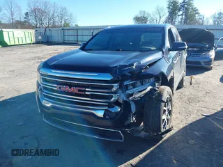 2021 GMC Acadia SLE with VIN 1GKKNKLA9MZ136112, listed as a IAAI auction lot 41212337 with 76,827 mi miles and . Bid and sale history available at DreamBid. Image 6.