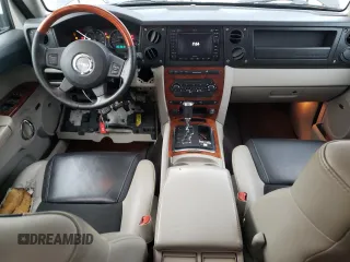 2007 Jeep Commander Overland with VIN 1J8HG68247C557731, listed as a Copart auction lot 87964795 with 174,195 mi miles and Salvage title. Bid and sale history available at DreamBid. Image 8.