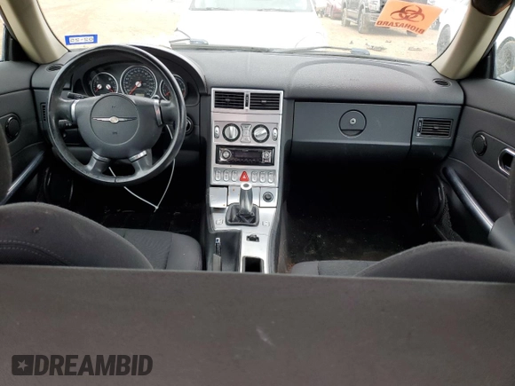 2005 Chrysler Crossfire z VIN 1C3AN59L75X033290, wystawiony jako Copart lot #83530624 z przebiegiem Nie podano mil oraz Czysty tytuł • Clean title. Historia ofert i sprzedaży dostępna na DreamBid. Obrazek 8.
