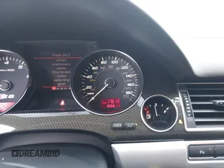 2007 Audi S8 z VIN WAUPN44E67N009650, wystawiony jako IAAI lot #41341680 z przebiegiem 166 611 mil mil oraz . Historia ofert i sprzedaży dostępna na DreamBid. Obrazek 15.