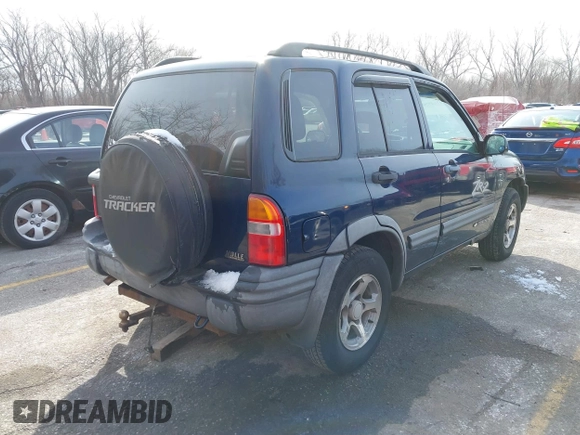 2004 Chevrolet Tracker ZR2 z VIN 2CNBJ734746917149, wystawiony jako IAAI lot #41649562 z przebiegiem 216 092 mil mil oraz . Historia ofert i sprzedaży dostępna na DreamBid. Obrazek 4.