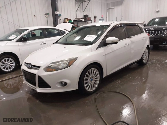 2012 Ford Focus Titanium with VIN 1FAHP3N26CL122364, listed as a IAAI auction lot 41777664 with NaN miles. Bid and sale history available at carsss.com. Image 2.