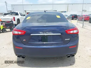 2016 Maserati Ghibli S Q4 z VIN ZAM57RTA4G1178696, wystawiony jako IAAI lot #42294337 z przebiegiem 69 752 mil mil oraz . Historia ofert i sprzedaży dostępna na DreamBid. Obrazek 16.