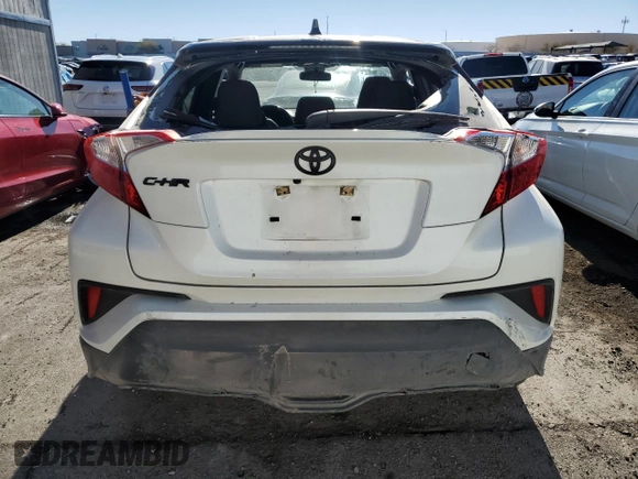 2021 Toyota C-HR LE with VIN JTNKHMBX3M1109664, listed as a Copart auction lot 87967165 with 84,688 mi miles and Salvage Title. Bid and sale history available at DreamBid. Image 6.