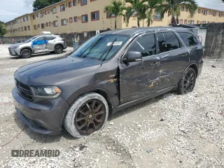 2015 Dodge Durango R/T z VIN 1C4SDHCT1FC891781, wystawiony jako Copart lot #62664555 z przebiegiem 107 573 mil mil oraz Szkoda całkowita • Salvage title. Historia ofert i sprzedaży dostępna na DreamBid. Obrazek 1.