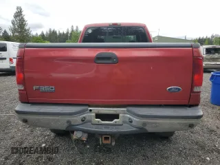 2002 Ford F-350 XL with VIN 1FTSW31F62ED57006, listed as a Copart auction lot 57156665 with 173,244 mi miles and Salvage title. Bid and sale history available at DreamBid. Image 6.