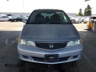 2001 Honda Odyssey EX z VIN 2HKRL18601H559033, wystawiony jako Copart lot #57119025 z przebiegiem 333 068 mil mil oraz Szkoda całkowita • Salvage title. Historia ofert i sprzedaży dostępna na DreamBid. Obrazek 5.