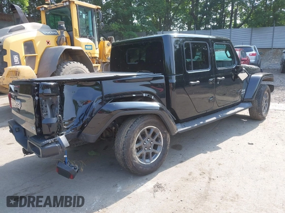 2020 Jeep Gladiator Overland with VIN 1C6HJTFG8LL176164, listed as a IAAI auction lot 42482369 with 80,009 mi miles and . Bid and sale history available at DreamBid. Image 4.