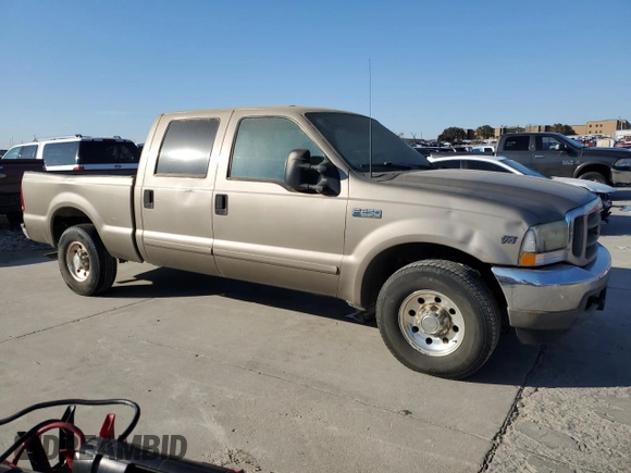 2002 Ford F-250 XL with VIN 1FTNW20S12EA04551, listed as a Copart auction lot 82785534 with 375,165 mi miles and Clean Title. Bid and sale history available at DreamBid. Image 4.