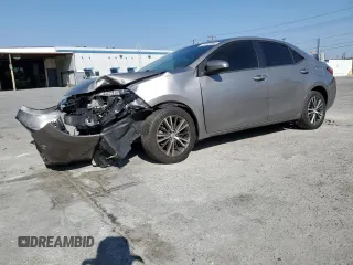 2016 Toyota Corolla L with VIN 5YFBURHEXGP474068, listed as a Copart auction lot 52185065 with 72,964 mi miles and Salvage Title. Bid and sale history available at DreamBid. Image 1.