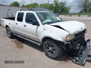 2003 Nissan Frontier XE z VIN 1N6ED29Y83C451126, wystawiony jako IAAI lot #42349509 z przebiegiem 182 193 mil mil oraz . Historia ofert i sprzedaży dostępna na DreamBid. Obrazek 1.
