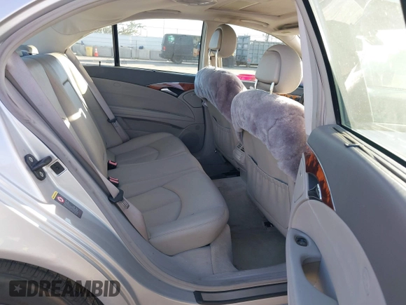 2005 Mercedes-Benz E-Class 3.2L with VIN WDBUF65JX5A718711, listed as a IAAI auction lot 41625603 with 145,024 mi miles. Bid and sale history available at carsss.com. Image 8.